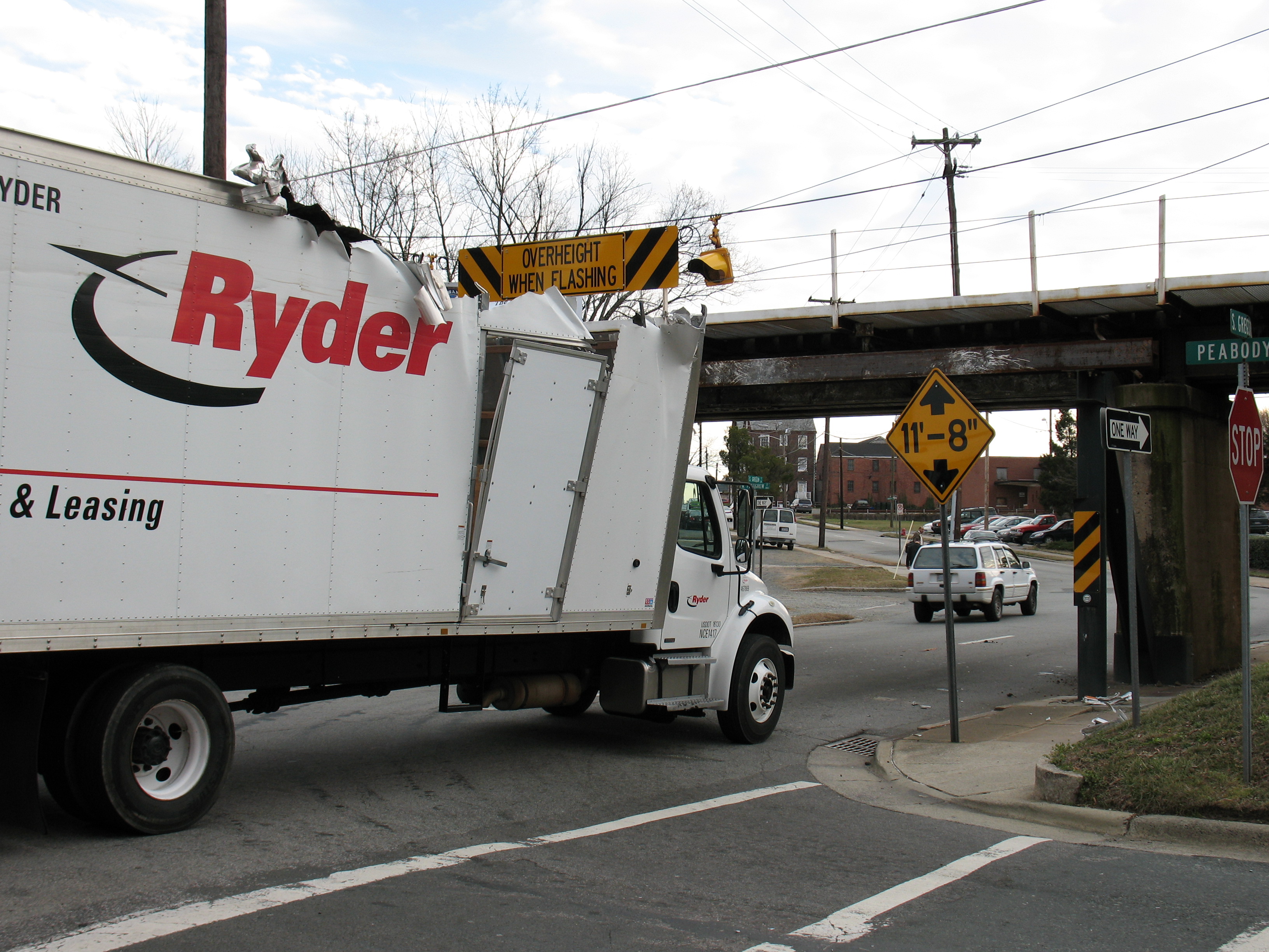 The 11-Foot-8 Bridge Strikes Again!